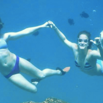 people snorkeling in water